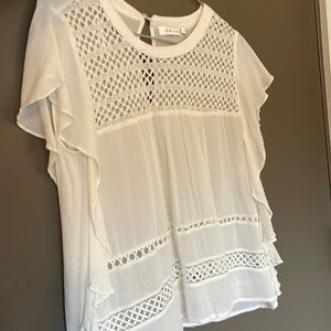 Gauzy, sheer white ruffled blouse